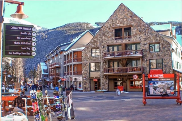 view of building exterior featuring a mountain view