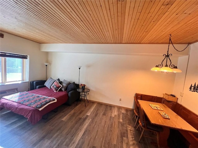 bedroom with wooden ceiling and dark hardwood / wood-style floors