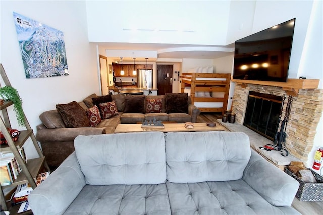 living room featuring a fireplace