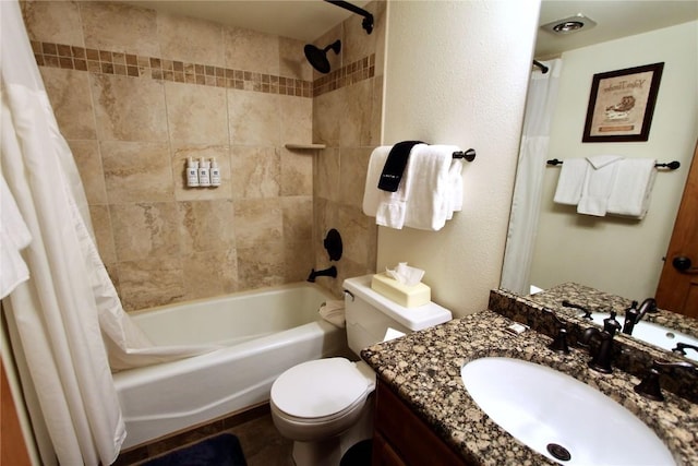 full bathroom with vanity, toilet, and shower / bath combo with shower curtain