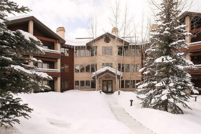 view of snow covered building