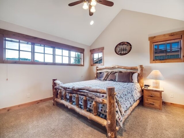 bedroom with carpet flooring, high vaulted ceiling, and ceiling fan