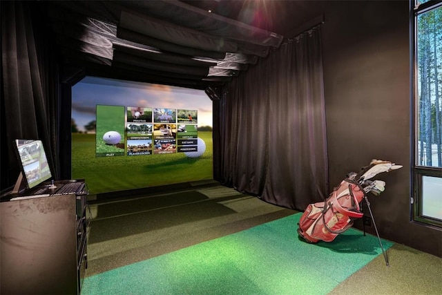 playroom featuring carpet floors and golf simulator