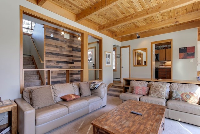 living room with stairs, beam ceiling, wood ceiling, and light colored carpet