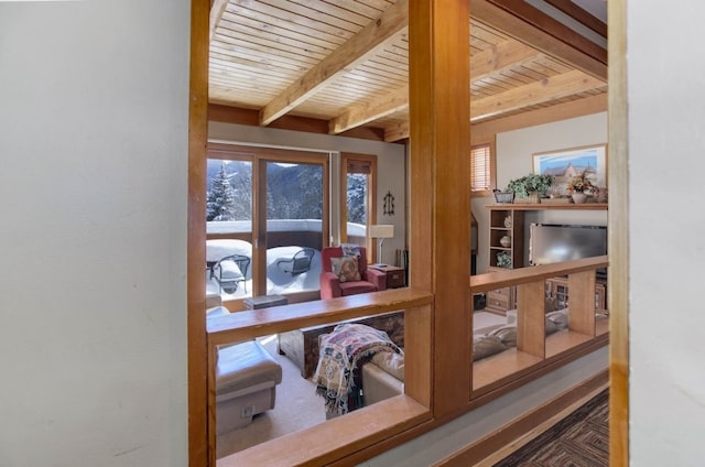 doorway with wood ceiling and beamed ceiling