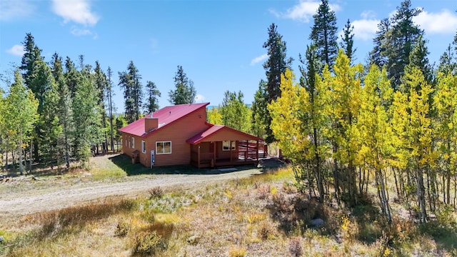 view of home's exterior with a deck