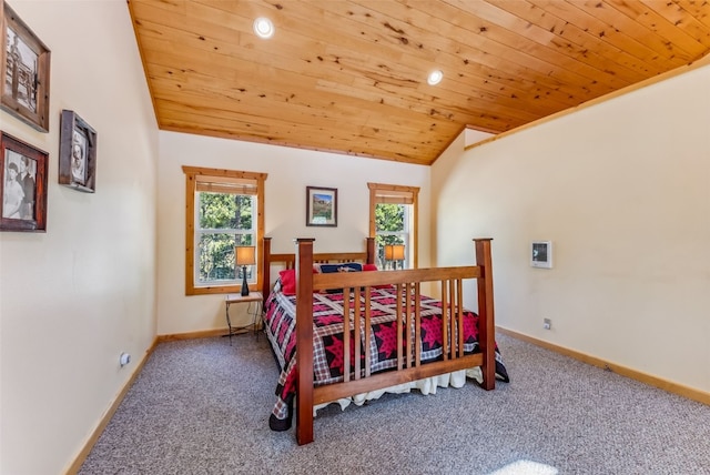 carpeted bedroom featuring wooden ceiling and lofted ceiling