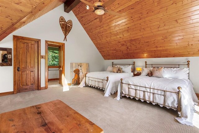 bedroom with vaulted ceiling with beams, ceiling fan, wood ceiling, and light carpet