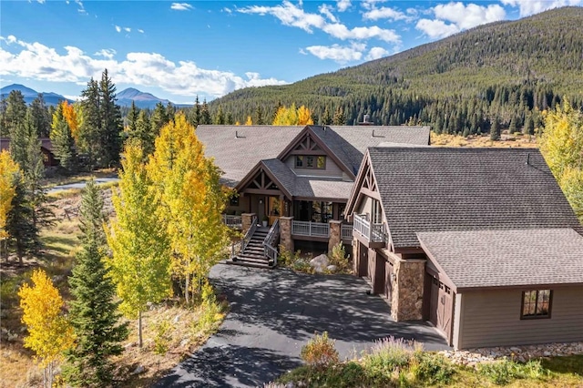 view of front of house with a mountain view and a garage