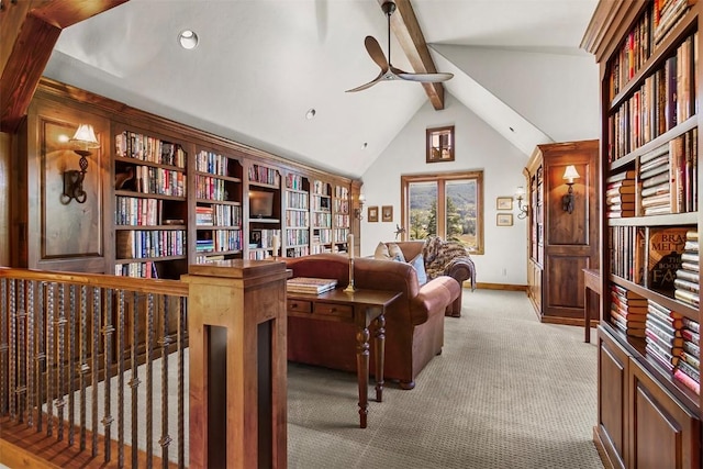 interior space with vaulted ceiling with beams, ceiling fan, and light colored carpet