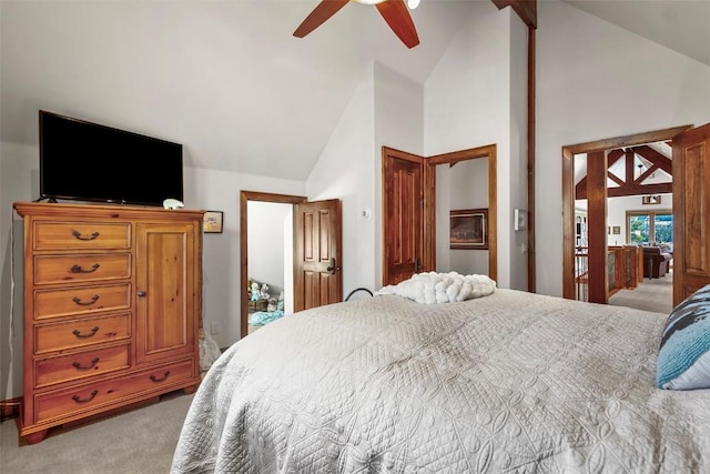 bedroom with carpet, high vaulted ceiling, and ceiling fan