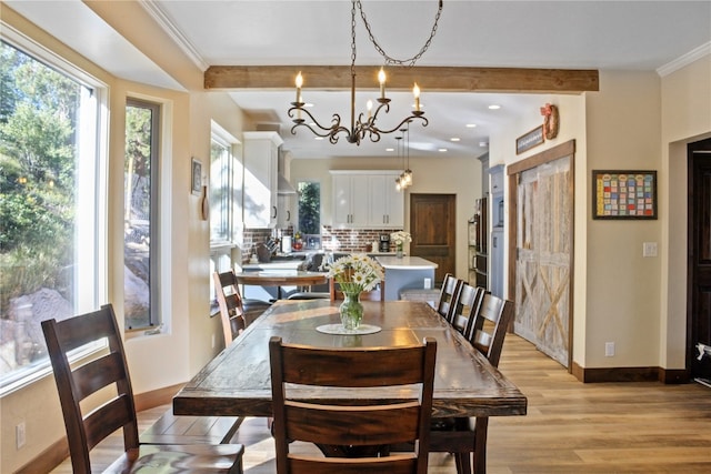 dining room featuring baseboards, beam ceiling, recessed lighting, crown molding, and light wood-type flooring