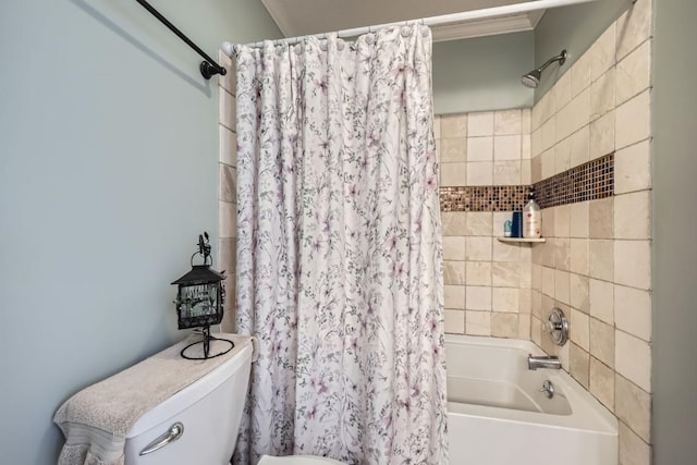 full bath with shower / bath combo with shower curtain and toilet