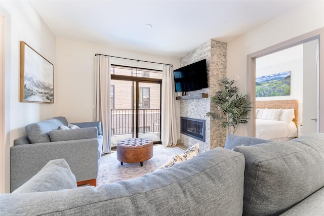 living room with a large fireplace