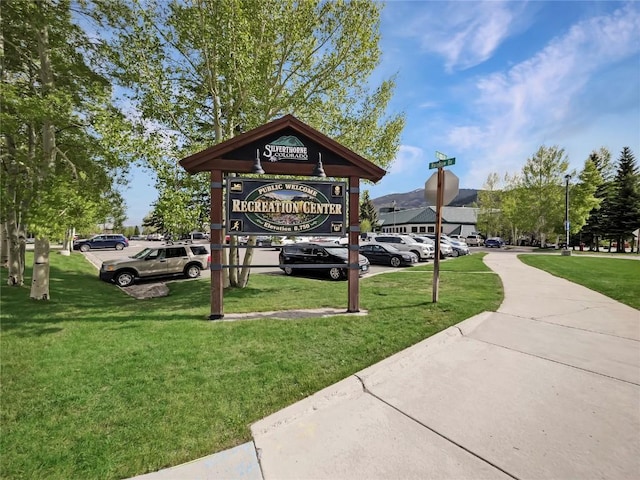 view of community featuring a lawn