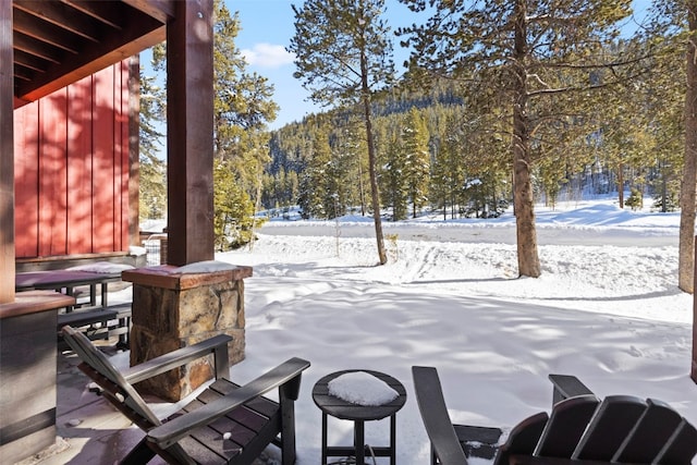 view of snow covered patio