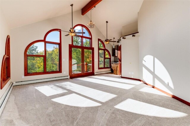 interior space featuring beamed ceiling, high vaulted ceiling, a baseboard heating unit, light colored carpet, and ceiling fan with notable chandelier