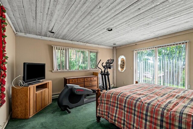 carpeted bedroom featuring wood ceiling