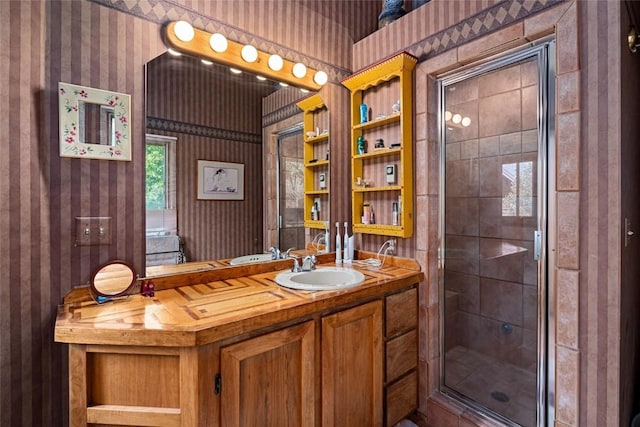 bathroom with vanity and walk in shower