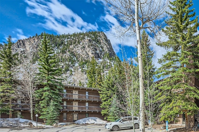 view of building exterior featuring a mountain view