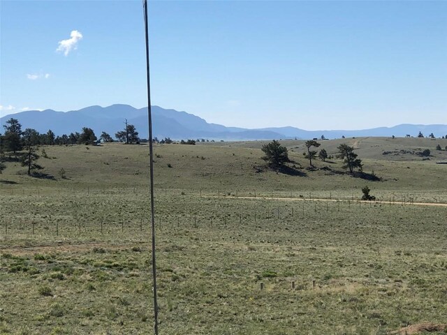 view of mountain feature featuring a rural view