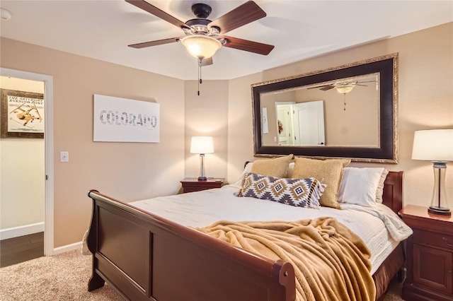 bedroom with ceiling fan and carpet floors