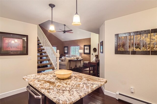 kitchen with ceiling fan, a baseboard heating unit, dark hardwood / wood-style floors, hanging light fixtures, and lofted ceiling