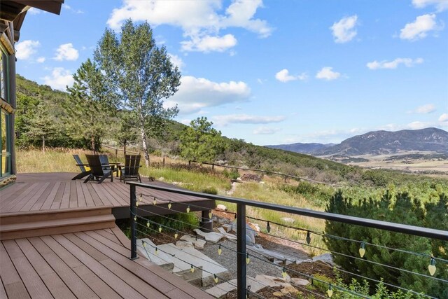 deck featuring a mountain view