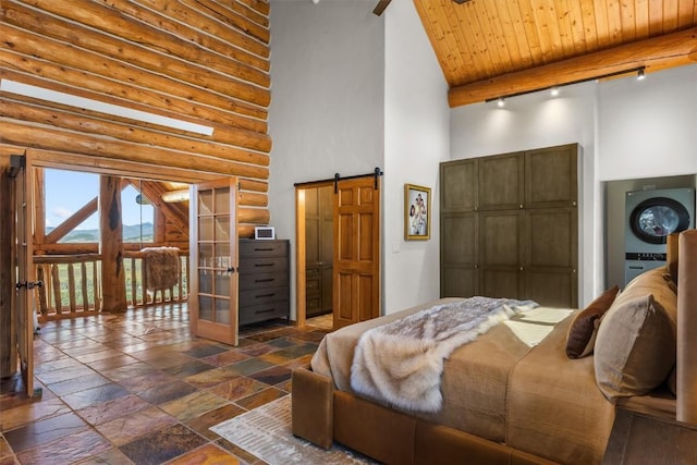 bedroom featuring a high ceiling, french doors, a barn door, log walls, and wood ceiling