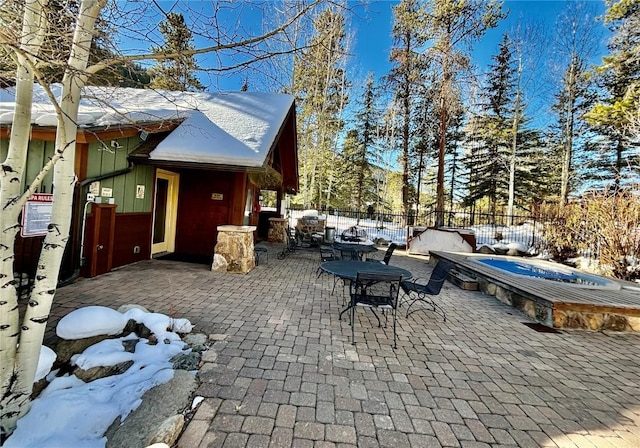 view of snow covered patio