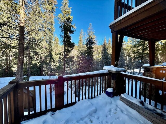 view of snow covered deck