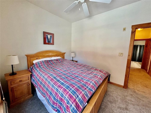 bedroom featuring ceiling fan and light carpet