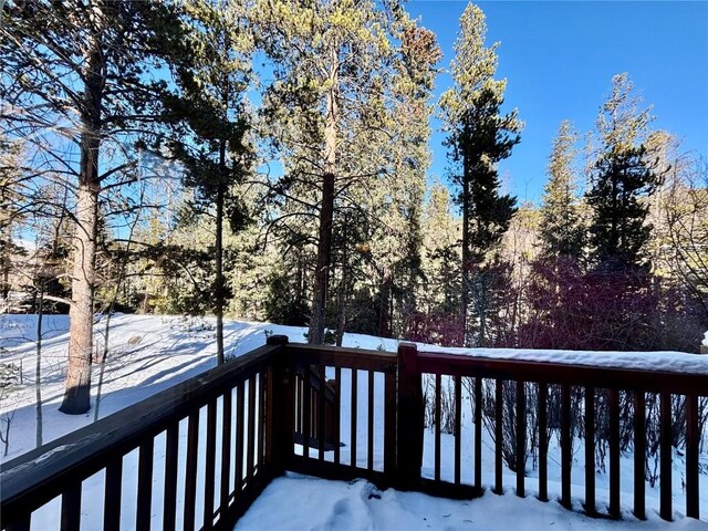 view of snow covered deck