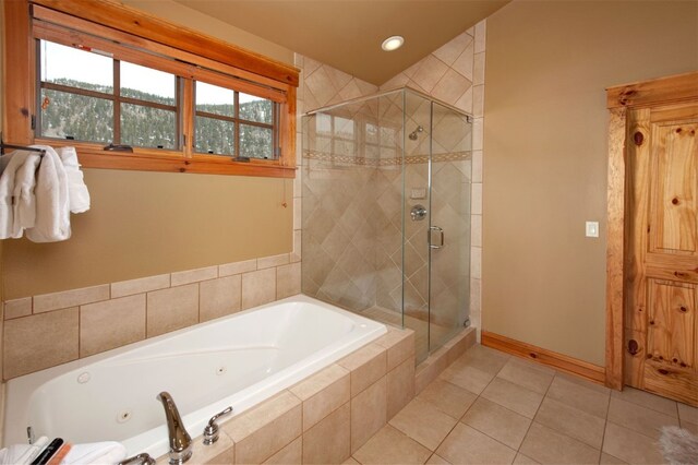 bedroom with baseboards, vaulted ceiling, and light colored carpet