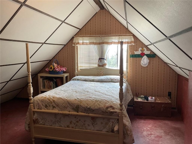 carpeted bedroom with vaulted ceiling