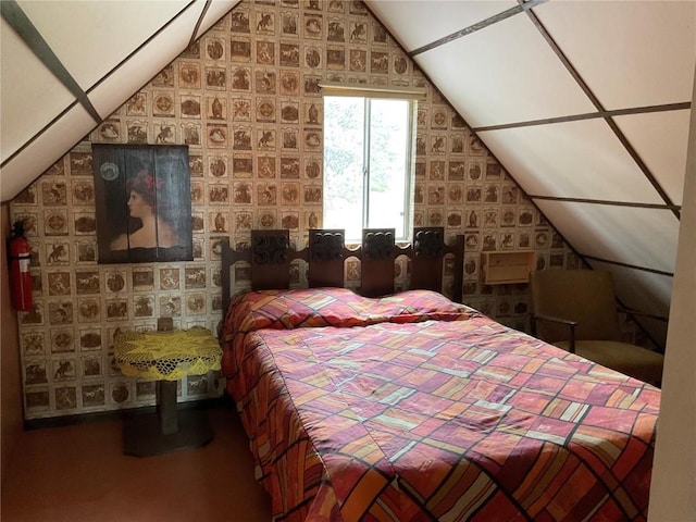 bedroom with lofted ceiling