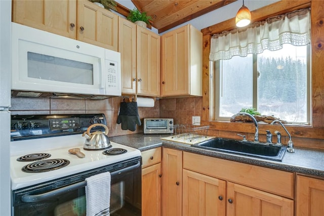 kitchen with electric range, white microwave, backsplash, and a sink