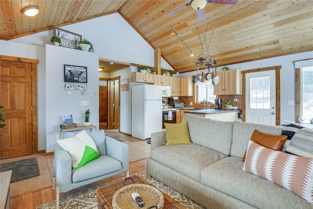 living area featuring light tile patterned flooring, wooden ceiling, high vaulted ceiling, and a ceiling fan