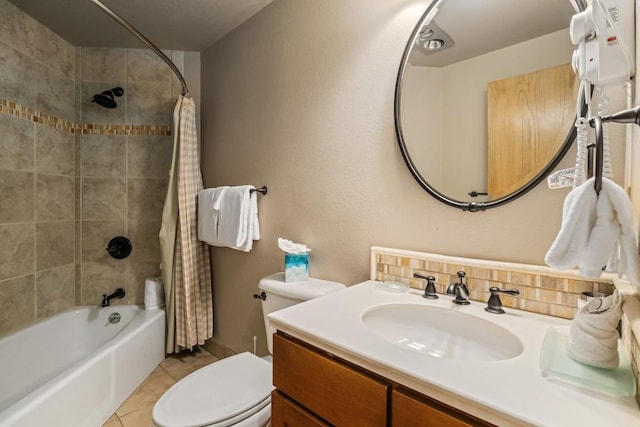 full bathroom with decorative backsplash, tile patterned floors, vanity, shower / tub combo with curtain, and toilet