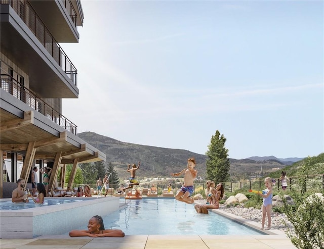 view of pool with a mountain view