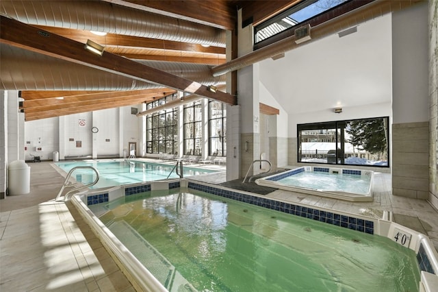 community pool featuring an indoor hot tub