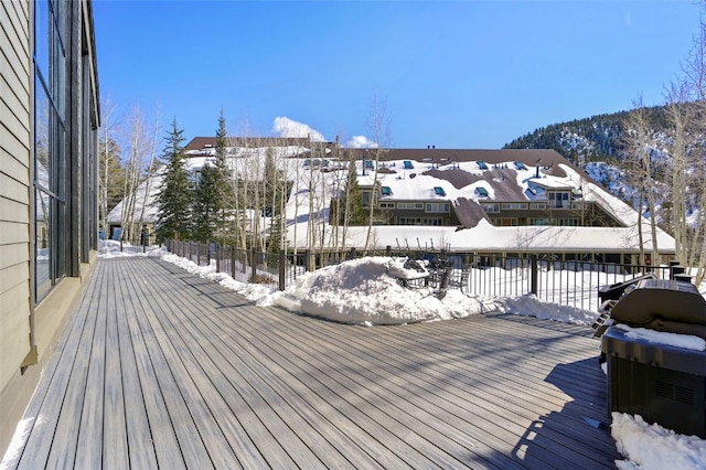 view of snow covered deck