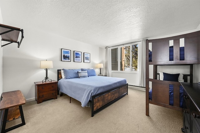 bedroom featuring a baseboard radiator, a textured ceiling, and light colored carpet