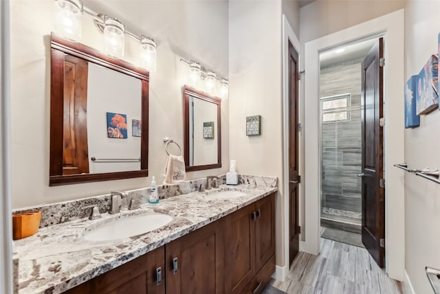 bathroom with double vanity and a sink