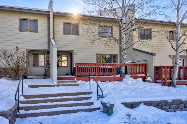 view of snow covered property