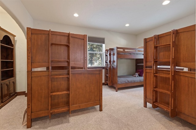 bedroom with recessed lighting and light colored carpet