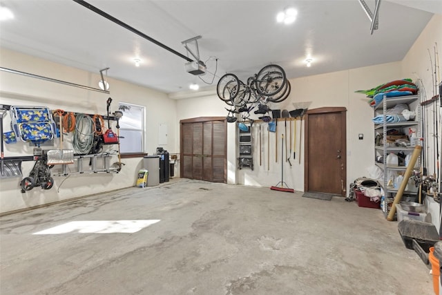 garage featuring a garage door opener