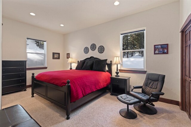 bedroom featuring recessed lighting, carpet flooring, and baseboards