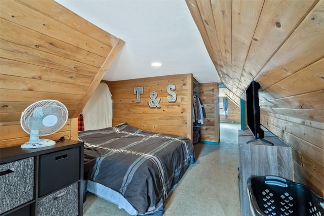 bedroom with wood ceiling, wooden walls, and vaulted ceiling