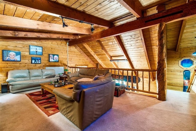 living room featuring wood walls, track lighting, lofted ceiling with beams, carpet flooring, and wood ceiling